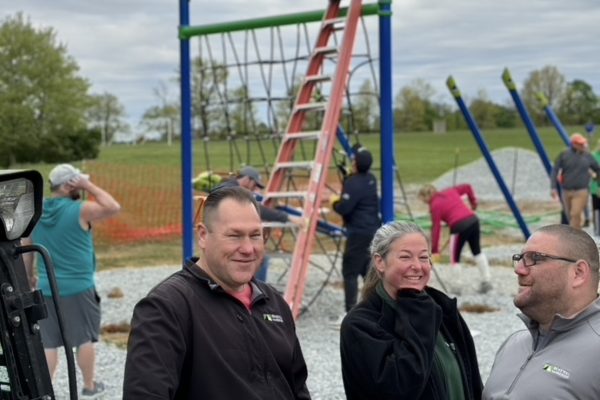 esler companies employee culture - playground volunteers smiling